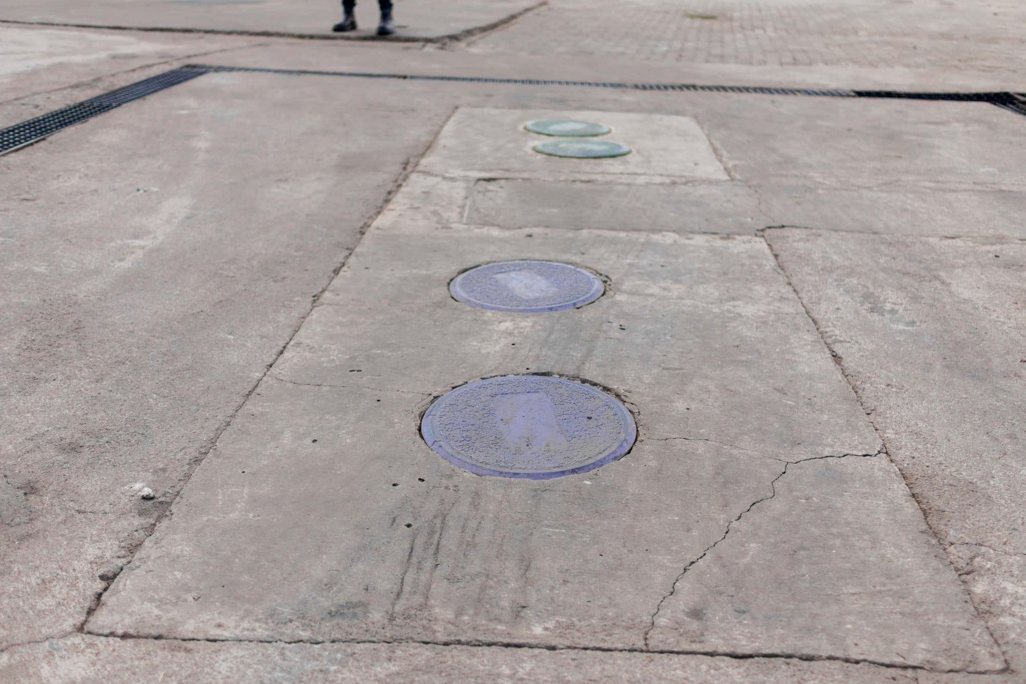 Flush inspection covers set into the slab